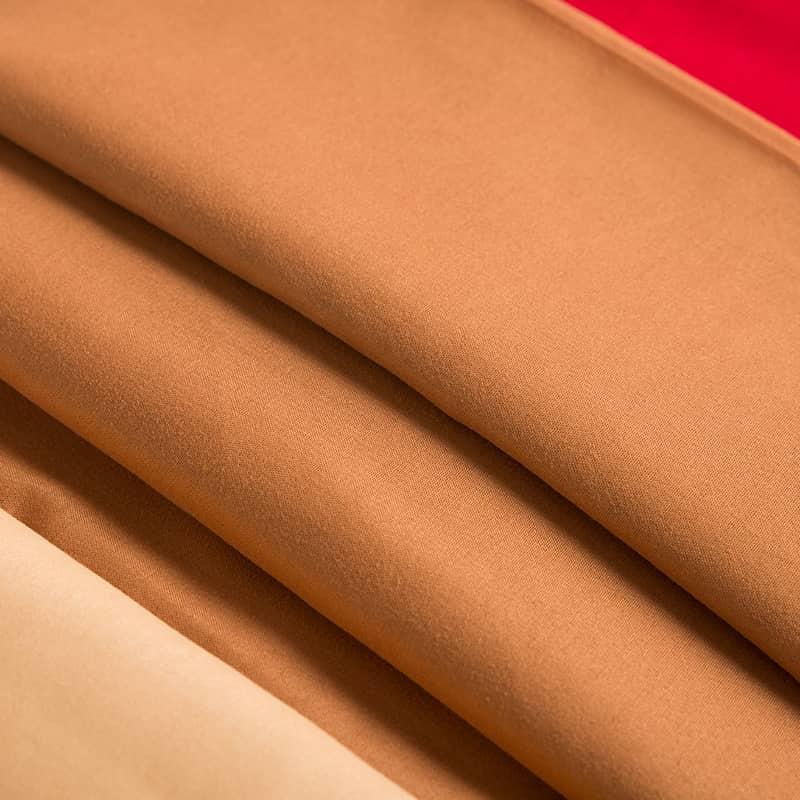 Almost no drop 100% polyester dyed brushed home textile fabric is soft and skin-friendly, durable and pantone color microfiber